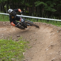 A rider hugs the turn on Snowshoe Mountain