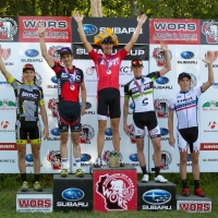 Todd Wells wears the coveted cheesehead on the top step