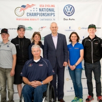 The riders pose with Jonathan Browning, President and CEO, Volkswagen Group of America