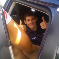 Eamon Lucas is all smiles in the team car before one of the stages